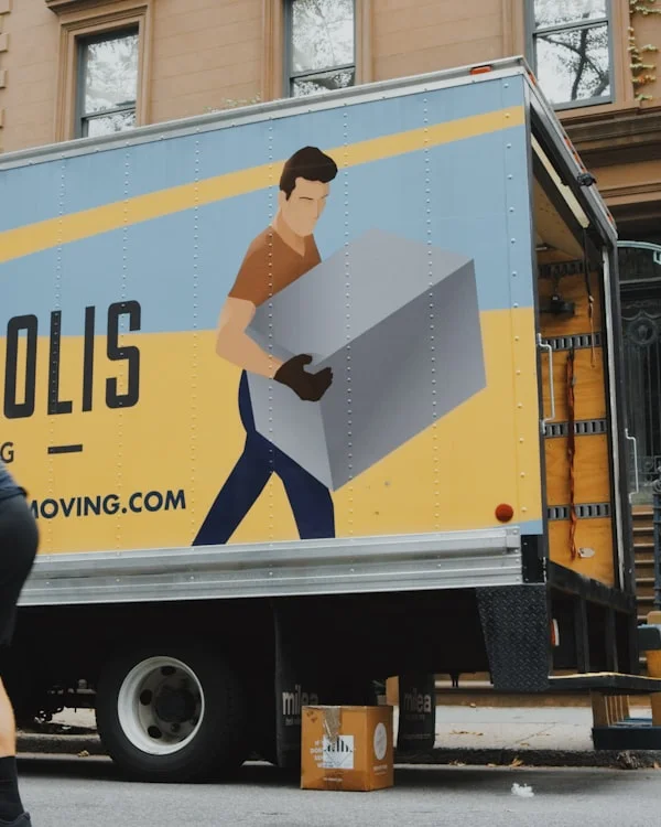 Movers carrying boxes