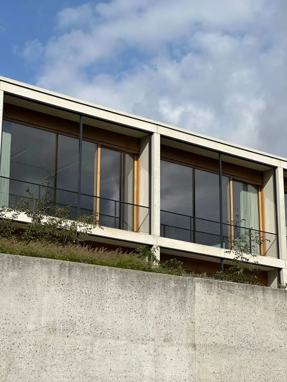 Modernist concrete residence at dusk