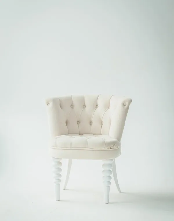Designer chair in a minimalist sunlit room