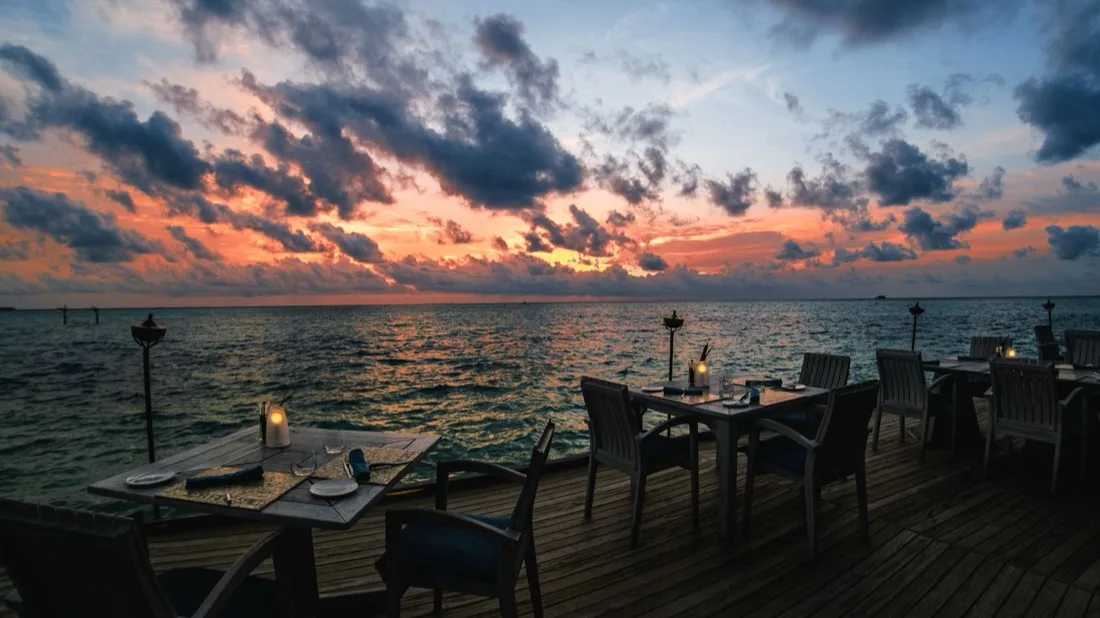 Oceanfront terrace at golden hour