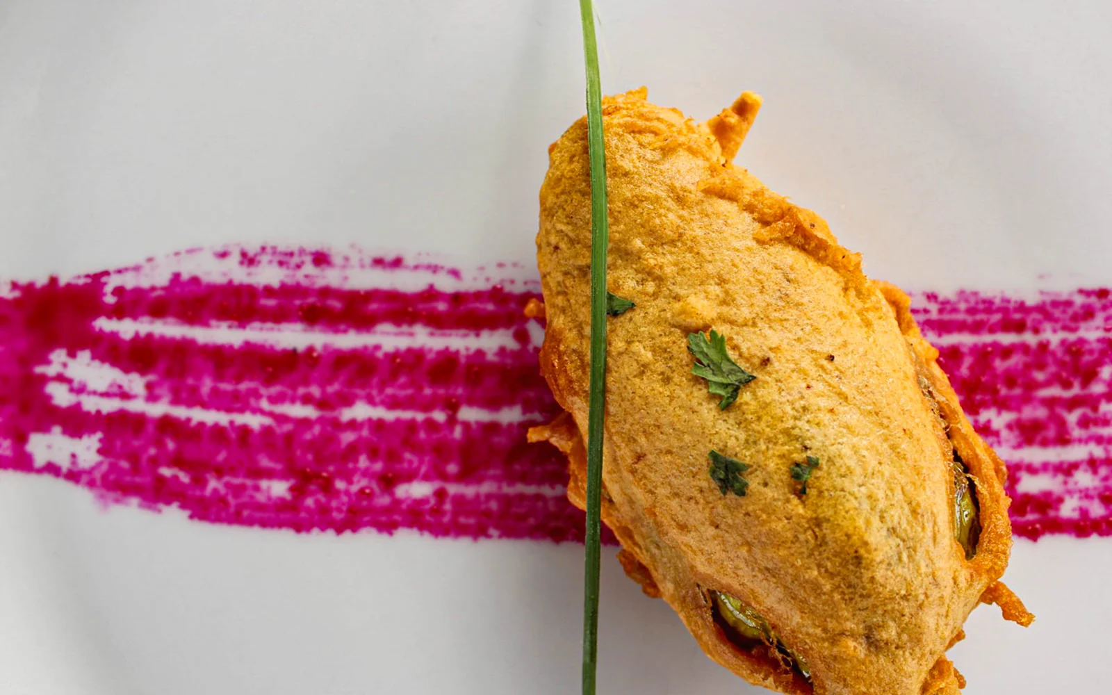 Exquisite gourmet plating composed like a sculpture